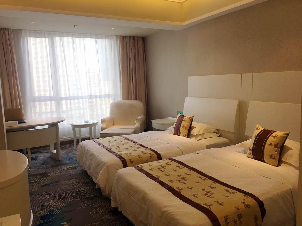 Dalian New Garden Hotel Exterior foto